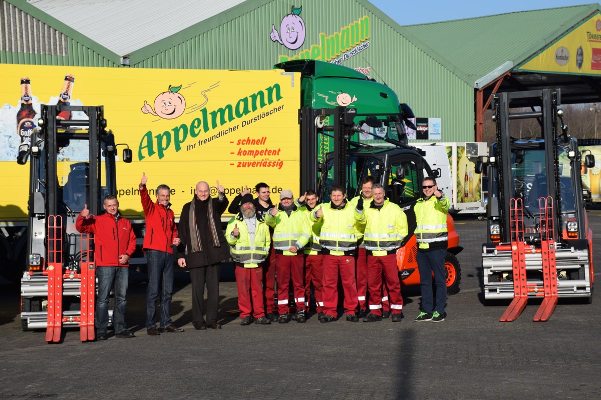 Team & neuer Fuhrpark